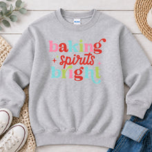 Load image into Gallery viewer, Baking Spirits Bright Christmas design on Ash Grey crewneck sweatshirt