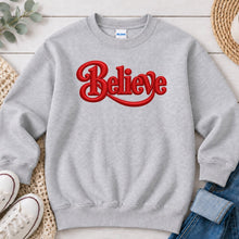 Load image into Gallery viewer, Believe Red Christmas design on Ash Grey crewneck sweatshirt