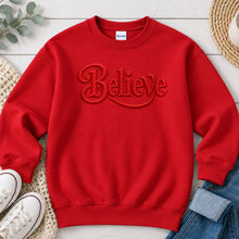 Load image into Gallery viewer, Believe Red Christmas design on Red crewneck sweatshirt
