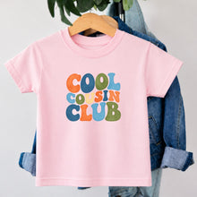 Load image into Gallery viewer, Cousin Cool Cousin Club design on pink kids t-shirt