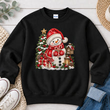 Load image into Gallery viewer, Cozy Snowman Red Scarf Lantern Winter design on Black crewneck sweatshirt