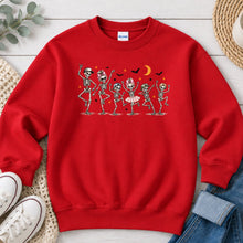 Load image into Gallery viewer, Dancing Skeletons Family Halloween design on Red crewneck sweatshirt