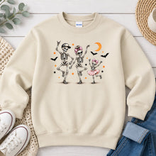 Load image into Gallery viewer, Dancing Skeletons Halloween design on Sand crewneck sweatshirt