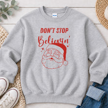 Load image into Gallery viewer, Don't Stop Believin' Santa Christmas design on Ash Grey crewneck sweatshirt