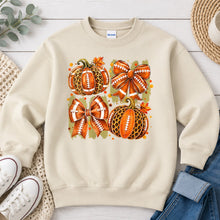 Load image into Gallery viewer, Football Pumpkins And Bows Fall design on Sand crewneck sweatshirt