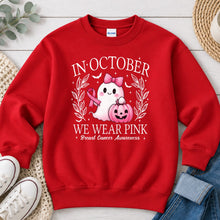 Load image into Gallery viewer, In October We Wear Pink Fall design on Red crewneck sweatshirt
