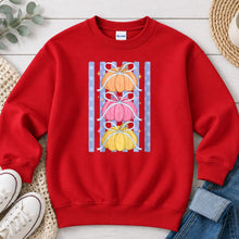 Load image into Gallery viewer, Stacked Pastel Pumpkins Fall design on Red crewneck sweatshirt