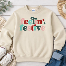 Load image into Gallery viewer, Feelin' Festive Christmas design on Sand crewneck sweatshirt