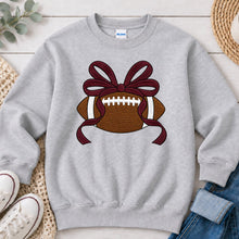 Load image into Gallery viewer, Football Maroon Bow Sports design on Ash Grey crewneck sweatshirt