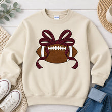 Load image into Gallery viewer, Football Maroon Bow Sports design on Sand crewneck sweatshirt