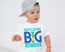 Load image into Gallery viewer, A young child wearing a white t-shirt with a graphic design that says "Professional Big Brother" and a gray baseball cap.