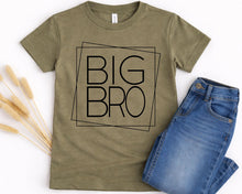 Load image into Gallery viewer, A green t-shirt with the text "BIG BRO" printed on it, along with a pair of blue jeans, are displayed on a white background.