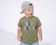 Load image into Gallery viewer, A young child wearing a green t-shirt with the text "BIG ROTER" and a gray baseball cap, standing in front of a white brick wall.