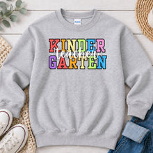 Load image into Gallery viewer, Kindergarten Teacher Rainbow Teacher design on Ash Grey crewneck sweatshirt