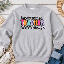 Load image into Gallery viewer, Kindergarten Teacher Vibes Teacher design on Ash Grey crewneck sweatshirt
