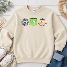 Load image into Gallery viewer, Mummy Frankenstein Vampire Trio Halloween design on Sand crewneck sweatshirt