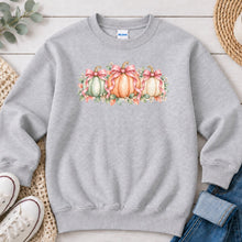 Load image into Gallery viewer, Pastel Pumpkin Row Pink Bows Fall design on Ash Grey crewneck sweatshirt