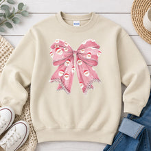 Load image into Gallery viewer, Santa Bow Pink Christmas design on Sand crewneck sweatshirt