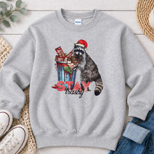 Load image into Gallery viewer, Stay Trashy Raccoon Christmas design on Ash Grey crewneck sweatshirt