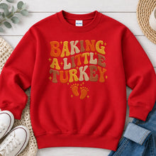 Load image into Gallery viewer, Baking a Little Turkey Thanksgiving design on Red crewneck sweatshirt
