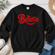 Load image into Gallery viewer, Believe Red Christmas design on Black crewneck sweatshirt
