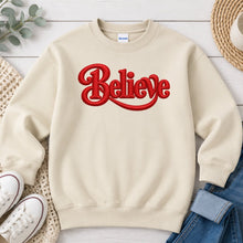 Load image into Gallery viewer, Believe Red Christmas design on Sand crewneck sweatshirt

