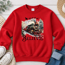 Load image into Gallery viewer, Believe Train Christmas design on Red crewneck sweatshirt
