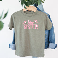 Load image into Gallery viewer, Big Sister Light Pink Heart Script design on sage kids t-shirt
