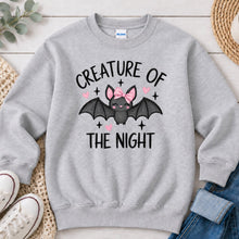 Load image into Gallery viewer, Creature Of The Night Pink Bow Bat Halloween design on Ash Grey crewneck sweatshirt
