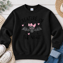 Load image into Gallery viewer, Creature Of The Night Pink Bow Bat Halloween design on Black crewneck sweatshirt
