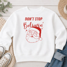 Load image into Gallery viewer, Don't Stop Believin' Santa Christmas design on White crewneck sweatshirt
