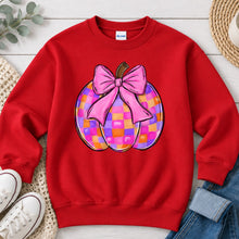 Load image into Gallery viewer, Coquette Checkered Pumpkin Pink Bow Fall design on Red crewneck sweatshirt
