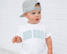 Load image into Gallery viewer, A young child wearing a gray baseball cap and a white t-shirt with the text "BIG BRO" printed on it.
