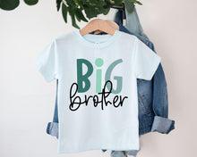 Load image into Gallery viewer, A white t-shirt with the text "BIG brother" printed on it, hanging on a clothing hanger.
