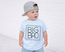 Load image into Gallery viewer, A young child wearing a gray baseball cap and a light blue t-shirt with the text "BIG BRO" printed on it, standing in front of a white brick wall.
