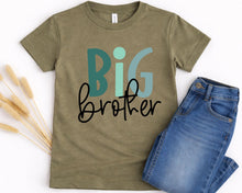Load image into Gallery viewer, A green t-shirt with the text "BIG brother" printed on it, along with a pair of blue jeans.
