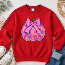Load image into Gallery viewer, Pink Bow Checkered Pumpkin Halloween design on Red crewneck sweatshirt

