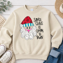 Load image into Gallery viewer, Santa Claus Is Coming To Town Christmas design on Sand crewneck sweatshirt
