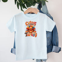 Load image into Gallery viewer, Thanksgiving Cutest Little Turkey design on light blue kids t-shirt
