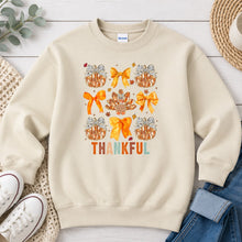 Load image into Gallery viewer, Thankful Pumpkins Turkey Bows Thanksgiving design on Sand crewneck sweatshirt
